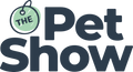 Logo with the words The Pet Show in large, bold letters. The is inside a green circular pet tag with a small loop, while Pet Show is written in dark blue, playful font to the right and below the tag.