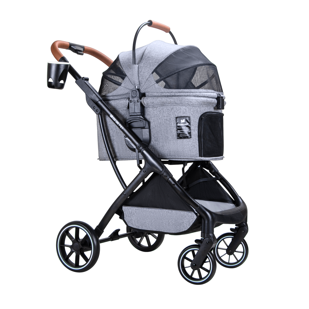 Full view of a grey pet stroller with black frame and wheels, featuring a cup holder, mesh windows, and additional storage compartments