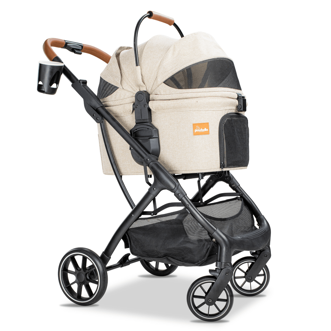 Beige Pawbella pet stroller with a sturdy black frame and convenient cup holder, designed for comfortable pet transport.