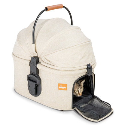 A cat looking out from the front opening of the beige Pawbella detachable carrier with the canopy fully closed.