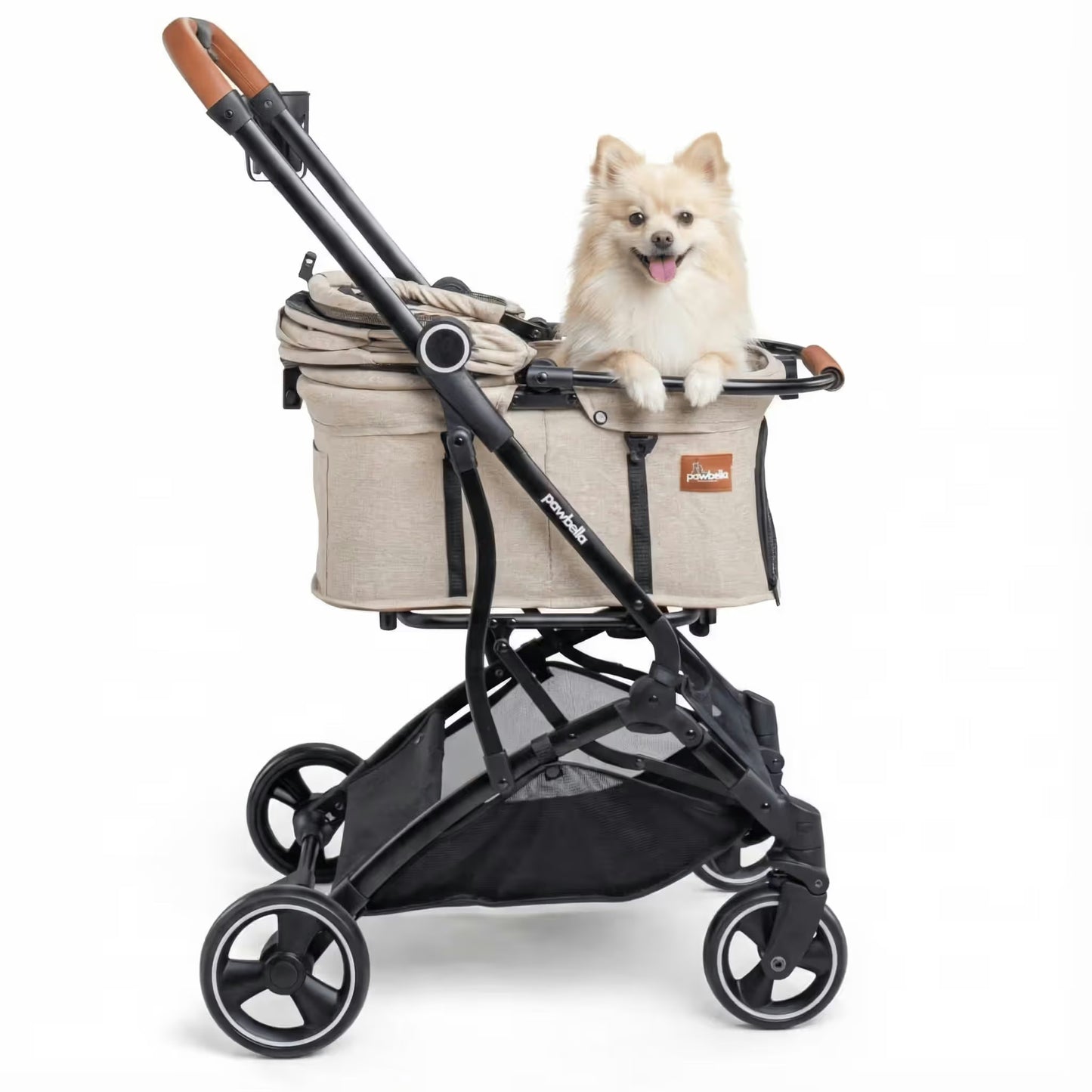 A small, fluffy dog sits happily in the Pawbella Essential Pet Stroller for small dogs and cats (up to 20kg), featuring black wheels and brown handle accents, ready for adventures in Australia.