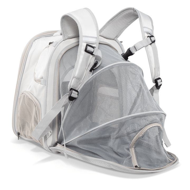 Angled view of the Pawbella expandable backpack pet carrier with mesh extension opened, showing adjustable straps and side pocket.