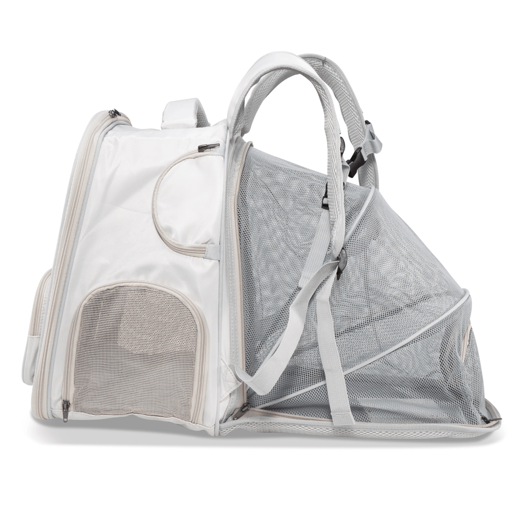 Expanded side view of the white Pawbella expandable backpack pet carrier, featuring a breathable mesh extension for added space