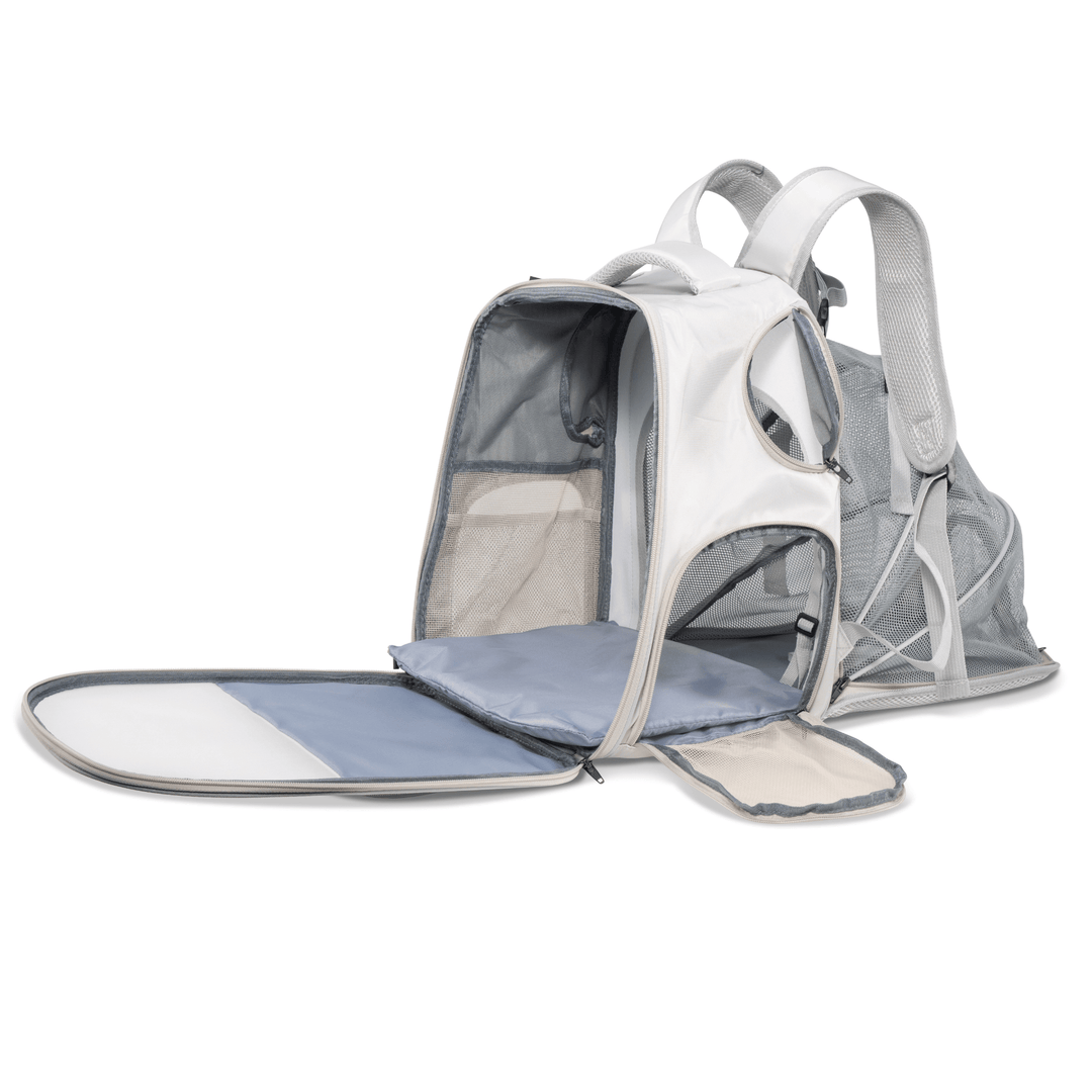 Open and expanded view of the Pawbella expandable backpack pet carrier, showing interior space with fold-out mat and mesh panels.