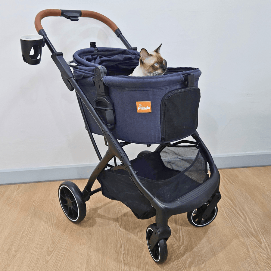 Full view of Pawbella Ultimate Pet Stroller with Siamese cat inside