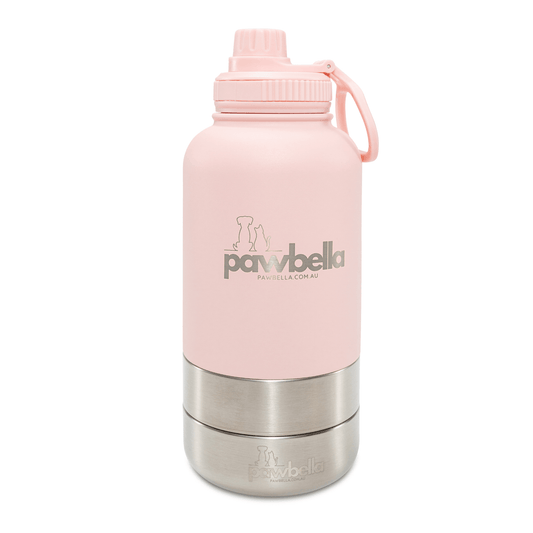 Pink Pawbella travel pet water bottle with a sturdy screw-on lid and stainless steel base, perfect for keeping pets hydrated during travel.