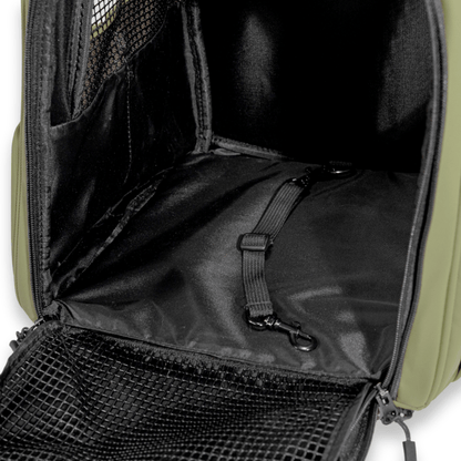 Inside view of olive green backpack featuring secure internal safety leash